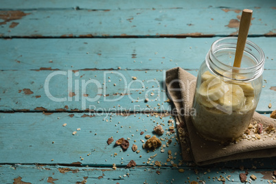 Fruit cereal in jar with napkin cloth