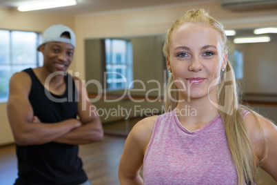 Portrait of beautiful female dancer with friend