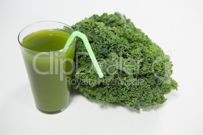 Close up of fresh kale and juice