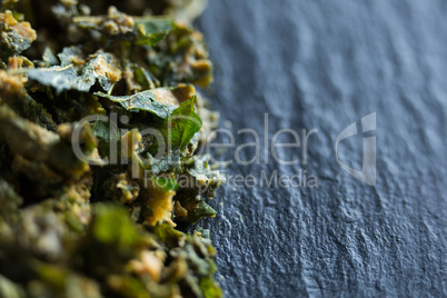 Close-up of kale on slate