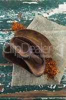 Various wooden scoop on table