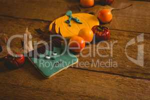 Close up of food with autumn leaves on table