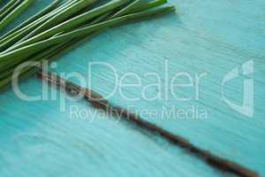 Garlic chives on wooden table