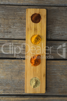 Various type of spices in wooden container