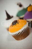Colorful cup cakes over white background