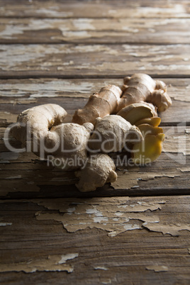High angle view of fresh gingers on damaged table