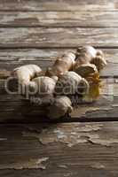 High angle view of fresh gingers on damaged table