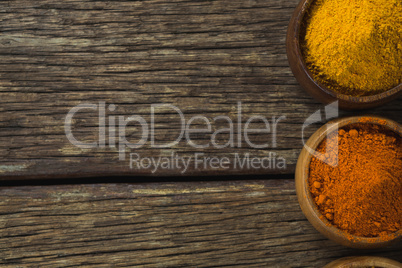 Spice powder on wooden table