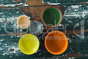 Various type of empty bowl on wooden table