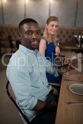 Portrait of friends having champagne