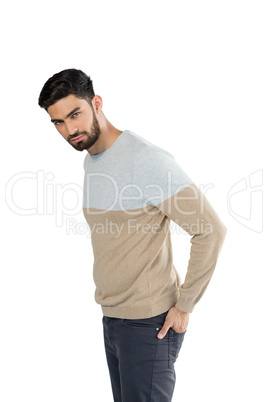 Portrait of handsome man posing against white background