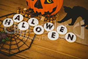 High angle view of cookies with Halloween text and decorations