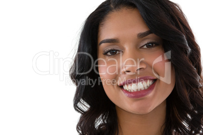 Close up portrait of smiling young woman