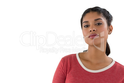 Close-up portrait of confident young woman