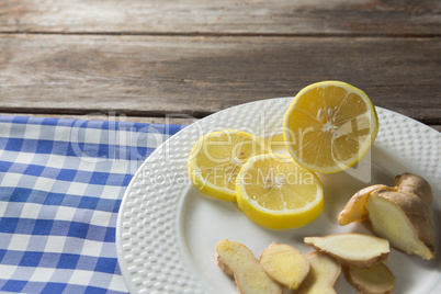 Close up of lemon and ginger slices in plate