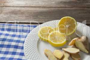 Close up of lemon and ginger slices in plate