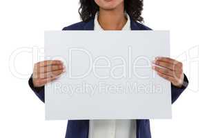 Businesswoman holding blank white placard