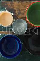Various type of empty bowl on wooden table
