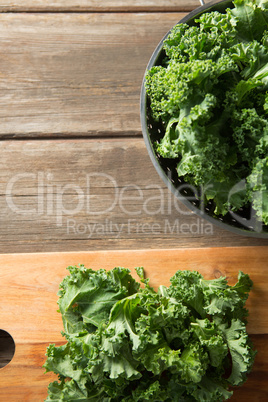 Fresh kale at wooden table