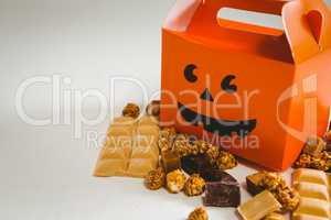 High angle view of orange box with chocolates