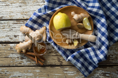Directly above view of various food with checked napkin on table