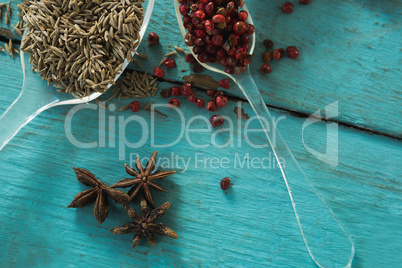 Various spices on wooden table