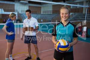 Portrait of volleyball player holding ball