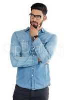 Handsome man posing against white background