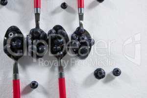 Blueberries arranged in a spoon
