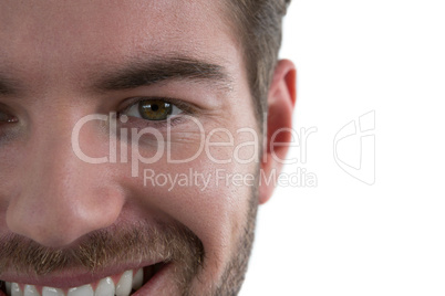 Man smiling against white background