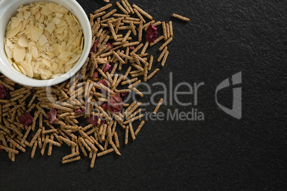 Bowl of corn bran with cereal bran stick spread