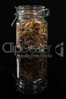 Mixed breakfast cereals in glass jar