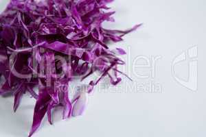 Chopped red cabbage on a white background