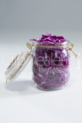 Chopped red cabbage in a jar