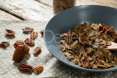 Bowl of wheat flakes and date palm