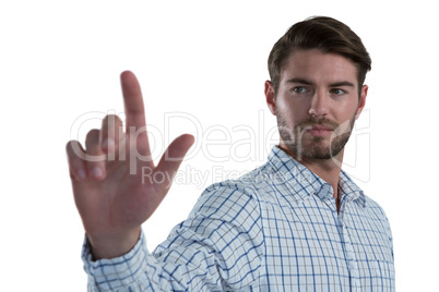 Man pretending to touch an invisible screen