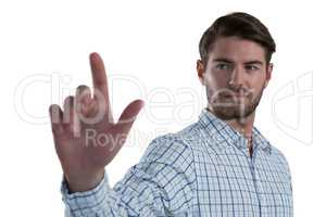 Man pretending to touch an invisible screen