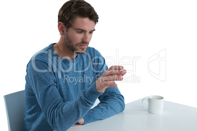 Man pretending to use an invisible screen