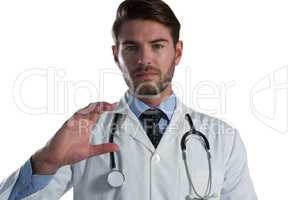 Male doctor pretending to hold an invisible object