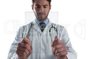Male doctor using glass digital tablet