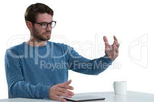 Man pretending to hold an invisible object