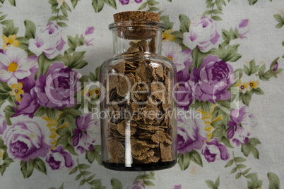 Wheat flakes in glass jar