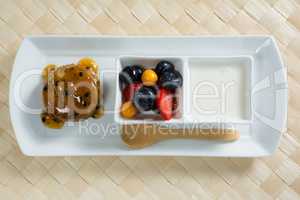 Healthy breakfast in serving plate on place mat