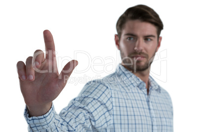 Man pretending to touch an invisible screen