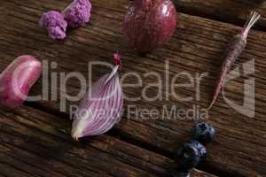 Various vegetable arranged on wooden table