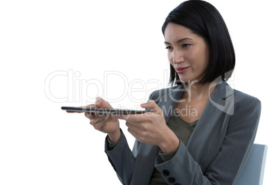 Businesswoman using digital tablet