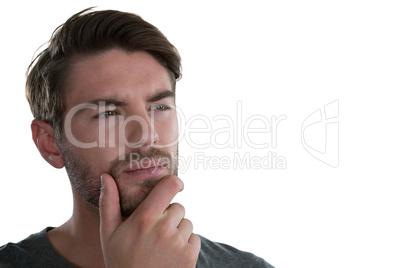 Thoughtful man against white background