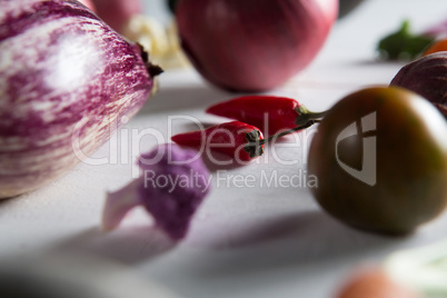 Close-up of red chili peppers with olive