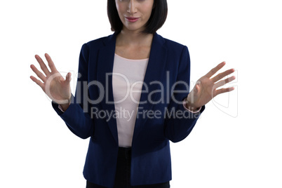 Businesswoman using invisible screen