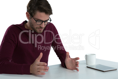 Man pretending to hold an invisible object